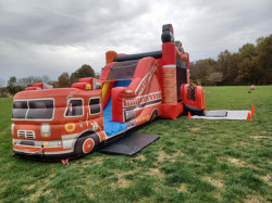 497888367 1279979544132282 4868247139783093751 n 1751293063 Fire Truck Bounce House w/ Slide - Wet or Dry