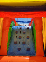 494642422 1266847252112178 7052672116680688100 n 1755456894 Mega Rainbow Bounce House w/ Slide - Wet or Dry