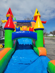 494679625 1266846998778870 1246468849997427972 n 1755456894 Mega Rainbow Bounce House w/ Slide - Wet or Dry